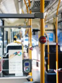 Close-up of machine part on the bus. sign to  stop the bus. 