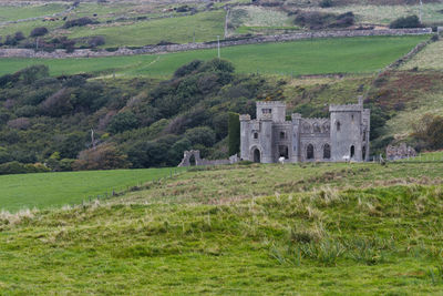 View of old ruin on field