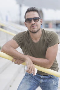 Portrait of young man wearing sunglasses