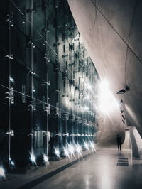 Close-up of illuminated lights against sky