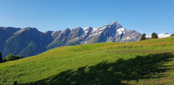 Scenic view of mountains against clear sky