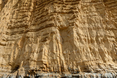 Low angle view of carving on rock