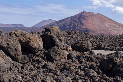 View of rock formations against sky