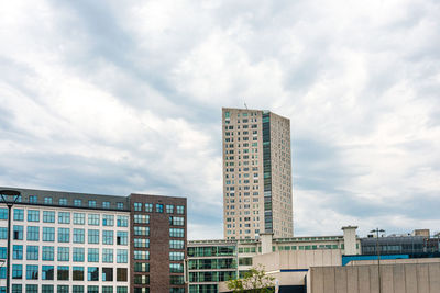 Low angle view of modern buildings against sky