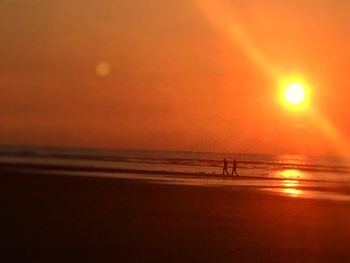 Scenic view of sea during sunset