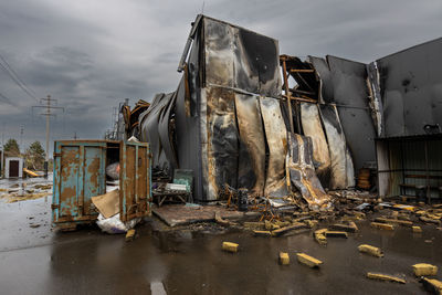 Outside the store, which was bombed, was looted by russian soldiers, occupiers.