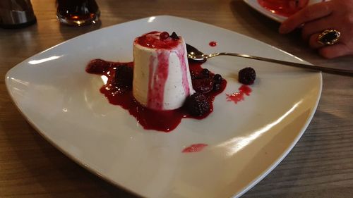 Close-up of cake served on table