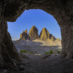 Scenic view of rocky mountains against clear sky