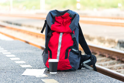 Rear view of man standing on railroad track