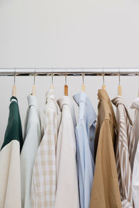 Close-up of clothes hanging on rack