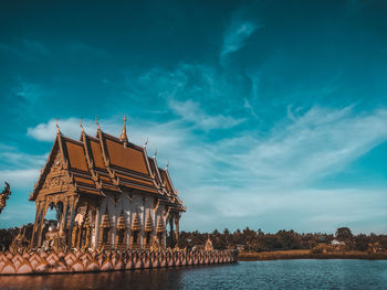 View of building against cloudy sky