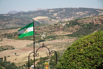 Close-up of andalusia flag against sky