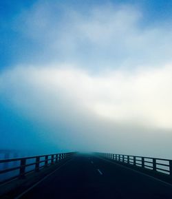 Road by sea against sky