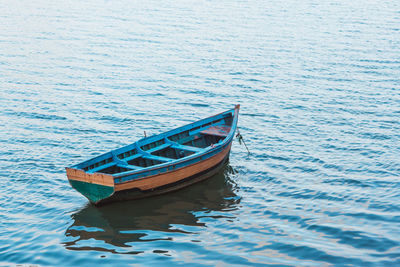 Boat moored in sea