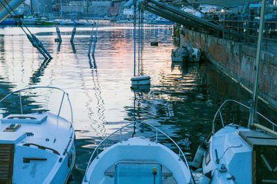 High angle view of boats moored at harbor