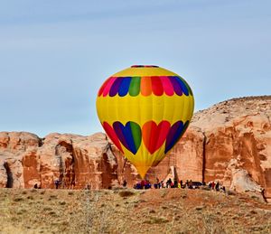 Multi colored hot air balloon balloons on rock