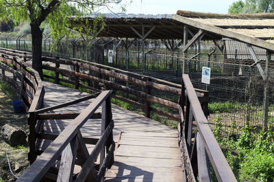 Wooden footbridge on footpath