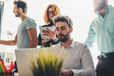 Business colleagues working on table