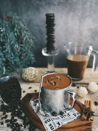 Close-up of coffee cup on table