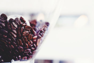 Close-up of coffee beans on table