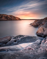 Scenic view of sea against sky during sunset