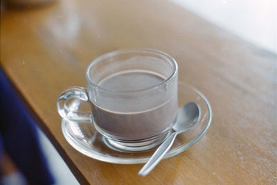 High angle view of coffee cup on table