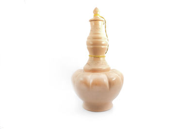 Close-up of chess pieces against white background