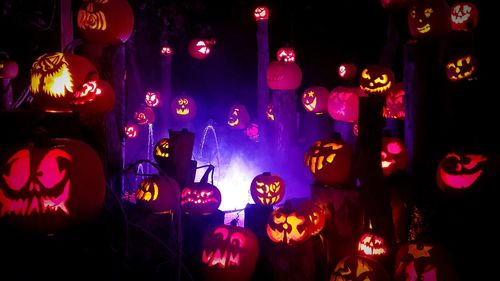 Illuminated lanterns at night