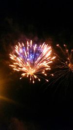 Low angle view of firework display