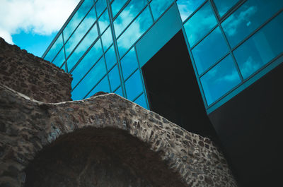 Low angle view of modern building against sky