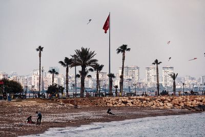 Panoramic view of street and buildings against sky