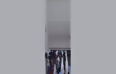 Clothes hanging on wall