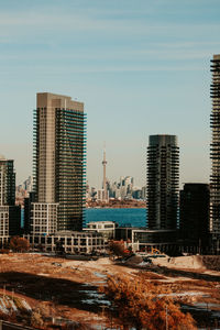 Modern buildings in city against sky