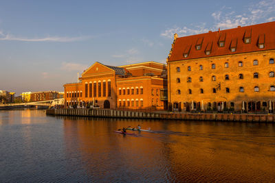 River in gdansk city during the sunset