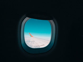 View of landscape seen through airplane window