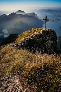 High angle view of cross on cliff