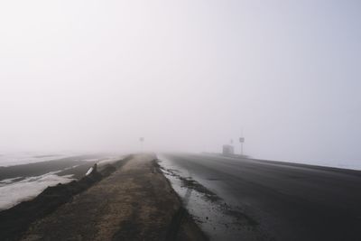 Road against sky during winter