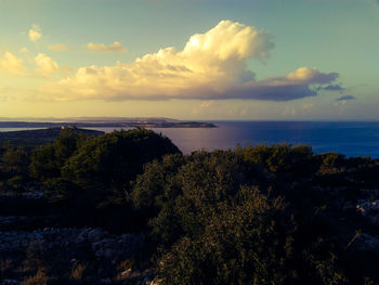 Scenic view of sea against sky at sunset