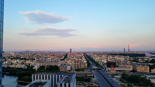 High angle view of city at sunset