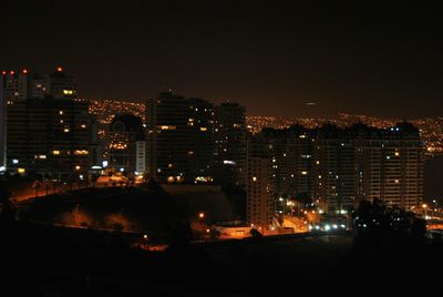 Illuminated cityscape at night