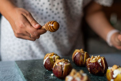 Midsection of person preparing food