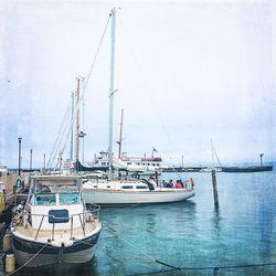Boats sailing in sea
