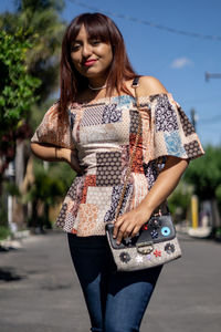 Elegant business woman enjoying walking the city after hard working day