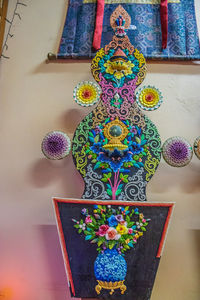 Low angle view of multi colored decoration on table