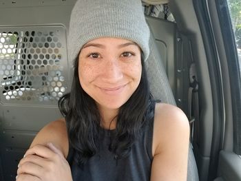 Portrait of woman wearing hat