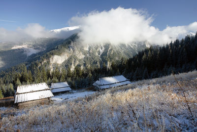 Scenic view of mountains against sky during winter