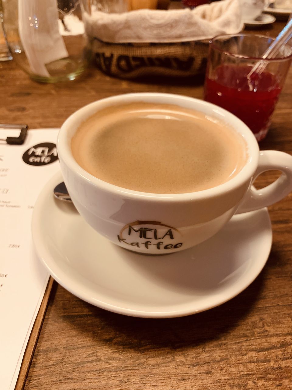 CLOSE-UP OF COFFEE ON TABLE