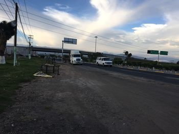 Road against cloudy sky