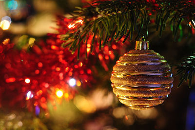 Close-up of illuminated christmas tree at night