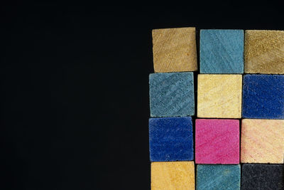 Full frame shot of multi colored pencils against black background
